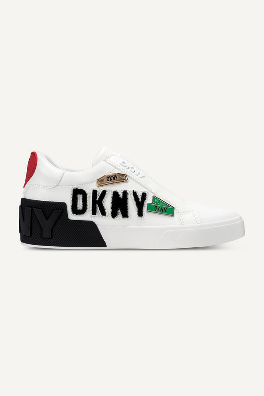 White DKNY MINDI CITY SIGNS SLIP ON SNEAKER