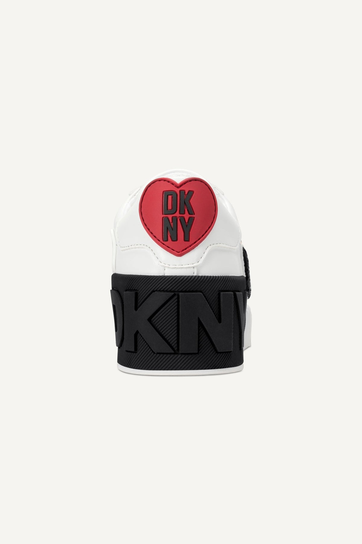 White DKNY MINDI CITY SIGNS SLIP ON SNEAKER