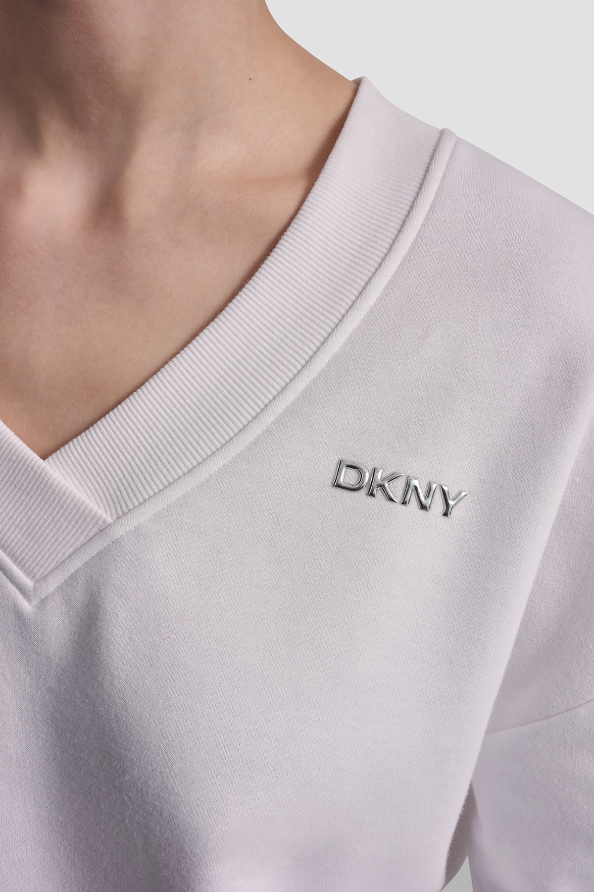 White DKNY METALLIC BUBBLE LOGO V-NECK PULLOVER